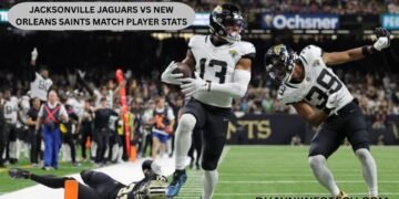 Player tackling on football field